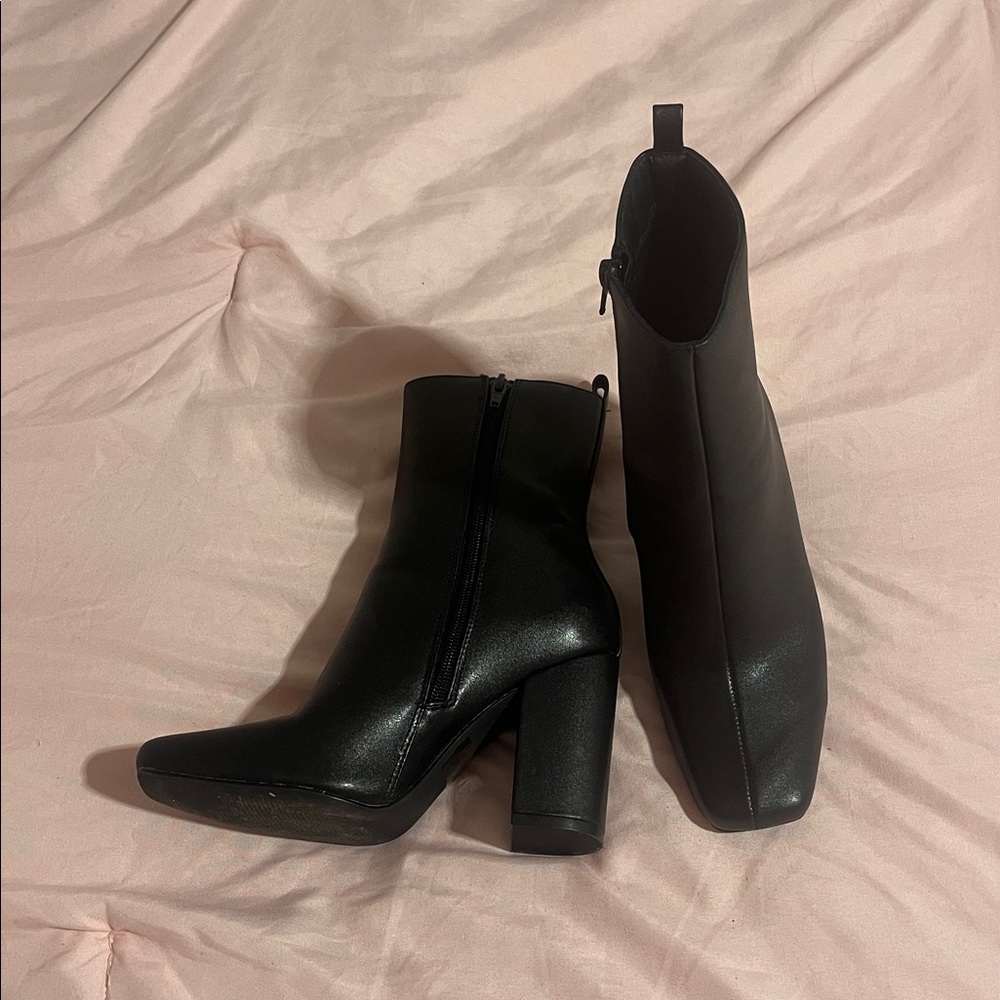 Sleek Black Heeled Boots